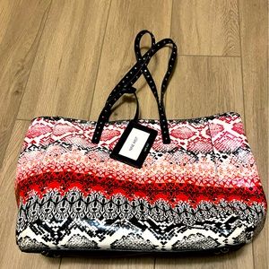 Nine West tote/laptop bag. Studded handle & integrated ID/luggage tag. Inner zip